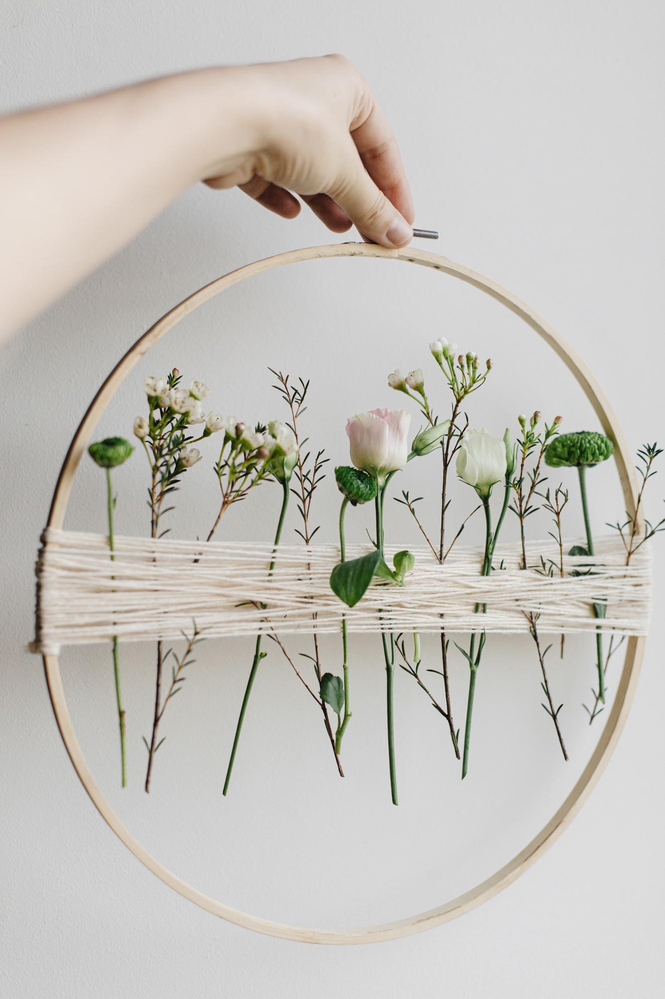 Hand embroidered linen hoop with floral motif